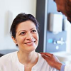 health care professional consults with a patient